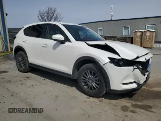 2021 Mazda CX-5 Touring z VIN JM3KFBCM9M1386068, wystawiony jako Copart lot #51735225 z przebiegiem 68 728 mil mil oraz Szkoda całkowita • Salvage title. Historia ofert i sprzedaży dostępna na DreamBid. Obrazek 4.