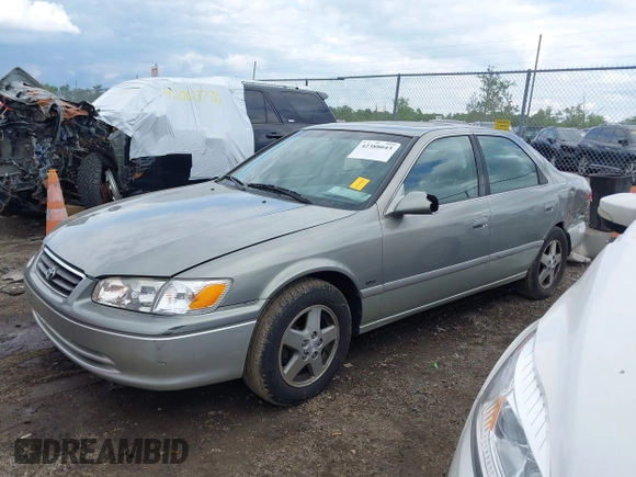 2001 Toyota Camry CE z VIN JT2BG22K410587070, wystawiony jako IAAI lot #42388043 z przebiegiem 119 183 mil mil oraz . Historia ofert i sprzedaży dostępna na DreamBid. Obrazek 18.