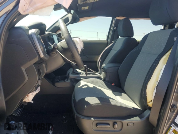 2023 Toyota Tacoma SR with VIN 3TYCZ5AN9PT131515, listed as a Copart auction lot 57900865 with Not provided miles and Salvage title. Bid and sale history available at DreamBid. Image 7.