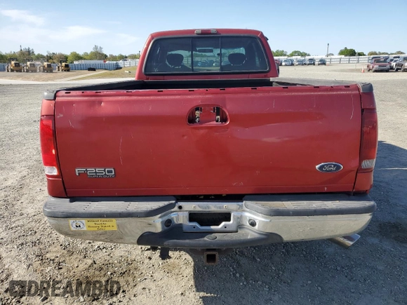 2002 Ford F-250 XL with VIN 1FTNX20F02EB64128, listed as a Copart auction lot 51979895 with 162,117 mi miles and Salvage title. Bid and sale history available at DreamBid. Image 6.