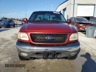 2002 Ford F-150 XL with VIN 1FTRX18L82NA54692, listed as a Copart auction lot 62559605 with 216,350 mi miles and Salvage title. Bid and sale history available at DreamBid. Image 5.