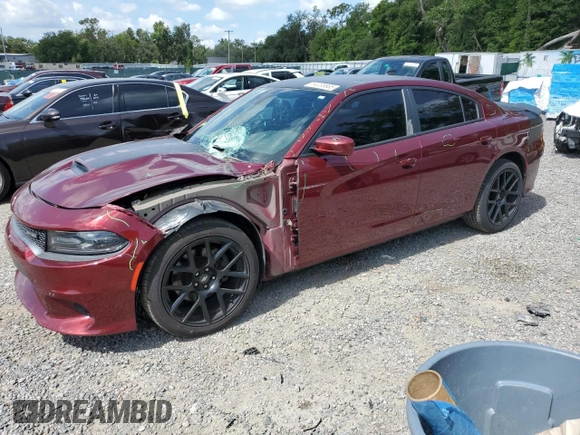 2017 Dodge Charger R/T with VIN 2C3CDXCT1HH543465, listed as a Copart auction lot 64038865 with 115,752 mi miles and Salvage title. Bid and sale history available at DreamBid. Image 1.