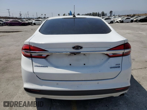 2017 Ford Fusion Hybrid SE with VIN 3FA6P0LUXHR171876, listed as a Copart auction lot 56241855 with 197,846 mi miles and Salvage title. Bid and sale history available at DreamBid. Image 6.