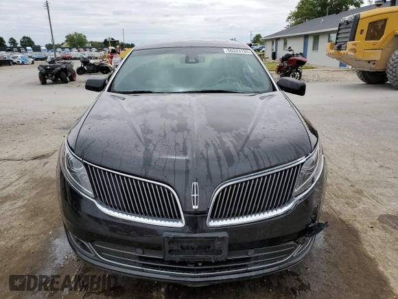 2015 Lincoln MKS z VIN 1LNHL9DK6FG604609, wystawiony jako Copart lot #56243135 z przebiegiem 82 622 mil mil oraz Szkoda całkowita • Salvage title. Historia ofert i sprzedaży dostępna na DreamBid. Obrazek 5.