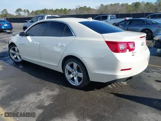 2014 Chevrolet Malibu LTZ with VIN 1G11J5SXXEF114531, listed as a IAAI auction lot 41409618 with 153,040 mi miles. Bid and sale history available at carsss.com. Image 3.