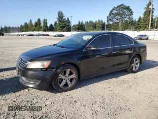 2014 Volkswagen Passat SE with VIN 1VWBT7A34EC107881, listed as a Copart auction lot 65431345 with 106,432 mi miles and Salvage title. Bid and sale history available at DreamBid. Image 1.