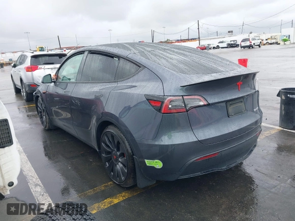 2023 Tesla Model Y Performance with VIN 7SAYGDEF0PF774282, listed as a IAAI auction lot 41807031 with Not Provided miles and . Bid and sale history available at DreamBid. Image 3.