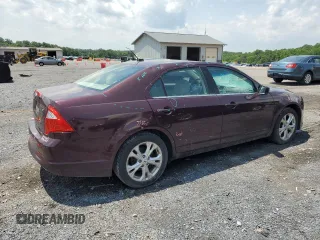 2012 Ford Fusion SE z VIN 3FAHP0HAXCR253297, wystawiony jako Copart lot #60302645 z przebiegiem 138 619 mil mil oraz Szkoda całkowita • Salvage title. Historia ofert i sprzedaży dostępna na DreamBid. Obrazek 3.