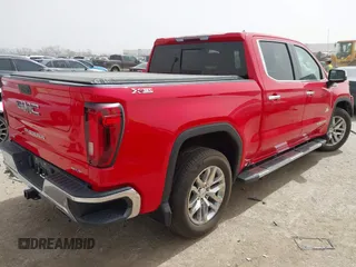 2021 GMC Sierra 1500 SLT z VIN 3GTU9DED9MG291383, wystawiony jako IAAI lot #41794666 z przebiegiem 93 457 mil mil oraz . Historia ofert i sprzedaży dostępna na DreamBid. Obrazek 4.