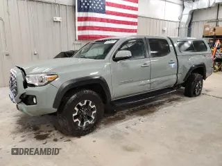 2023 Toyota Tacoma SR5 z VIN 3TMDZ5BN8PM162785, wystawiony jako Copart lot #56599635 z przebiegiem 24 853 mil mil oraz Szkoda całkowita • Salvage title. Historia ofert i sprzedaży dostępna na DreamBid. Obrazek 1.