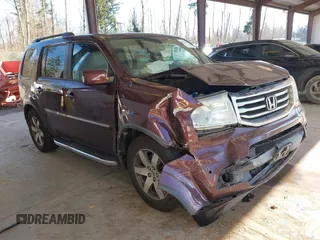 2015 Honda Pilot Touring with VIN 5FNYF4H95FB023618, listed as a IAAI auction lot 41703262 with 191,627 mi miles. Bid and sale history available at carsss.com. Image 1.