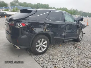 2016 Lexus RX 350 z VIN 2T2BZMCA5GC009119, wystawiony jako Copart lot #60089925 z przebiegiem 129 877 mil mil oraz Szkoda całkowita • Salvage title. Historia ofert i sprzedaży dostępna na DreamBid. Obrazek 3.