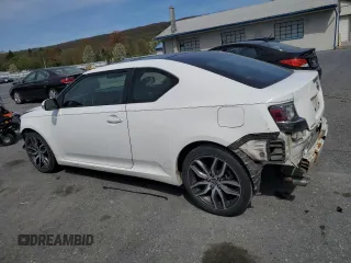 2014 Scion tC z VIN JTKJF5C70E3084697, wystawiony jako Copart lot #54307295 z przebiegiem 174 073 mil mil oraz Szkoda całkowita • Salvage title. Historia ofert i sprzedaży dostępna na DreamBid. Obrazek 2.