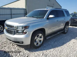 2019 Chevrolet Tahoe LT with VIN 1GNSKBKC2KR208134, listed as a Copart auction lot 58936185 with 100,558 mi miles and Salvage title. Bid and sale history available at DreamBid. Image 1.