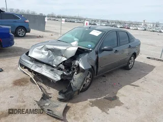 2004 Ford Focus ZTS with VIN 1FAFP38Z94W165483, listed as a IAAI auction lot 41775001 with 222,589 mi miles and . Bid and sale history available at carsss.com. Image 17.