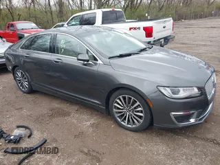 2017 Lincoln MKZ Select z VIN 3LN6L5C92HR602575, wystawiony jako IAAI lot #41923444 z przebiegiem 89 543 mil mil oraz . Historia ofert i sprzedaży dostępna na DreamBid. Obrazek 1.