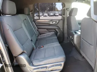 2023 Chevrolet Suburban LS z VIN 1GNSKBKD0PR129979, wystawiony jako Copart lot #53000485 z przebiegiem 68 896 mil mil oraz Czysty tytuł • Clean title. Historia ofert i sprzedaży dostępna na DreamBid. Obrazek 11.