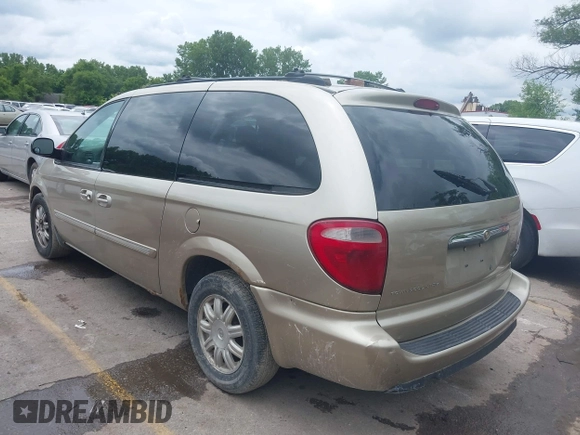 2005 Chrysler Town & Country Touring z VIN 2C8GP54L25R491310, wystawiony jako IAAI lot #42363567 z przebiegiem 203 608 mil mil oraz . Historia ofert i sprzedaży dostępna na DreamBid. Obrazek 3.