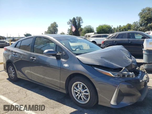 2021 Toyota Prius LE with VIN JTDKAMFP5M3177018, listed as a Copart auction lot 63930405 with 58,439 mi miles and Salvage title. Bid and sale history available at DreamBid. Image 4.