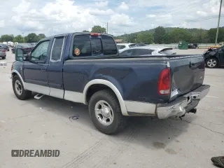 2003 Ford F-150 XL with VIN 2FTRX17L83CA53082, listed as a Copart auction lot 63836305 with 219,269 mi miles and Salvage title. Bid and sale history available at DreamBid. Image 2.