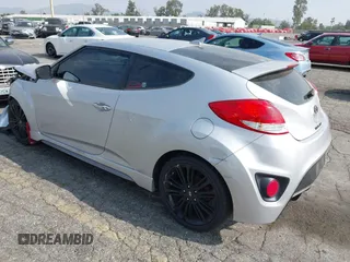 2016 Hyundai Veloster Turbo with VIN KMHTC6AE3GU263387, listed as a IAAI auction lot 42040177 with 96,864 mi miles. Bid and sale history available at carsss.com. Image 3.