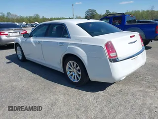 2012 Chrysler 300 Limited with VIN 2C3CCACG4CH250588, listed as a IAAI auction lot 41943257 with 236,242 mi miles and . Bid and sale history available at DreamBid. Image 3.