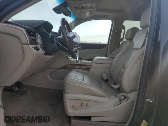2015 GMC Yukon Denali with VIN 1GKS1CKJ1FR303049, listed as a Copart auction lot 82435514 with 100,693 mi miles and Salvage Title. Bid and sale history available at carsss.com. Image 7.