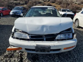 1996 Honda Accord DX with VIN 1HGCD5627TA044990, listed as a Copart auction lot 44457905 with 67,798 mi miles and Salvage Title. Bid and sale history available at carsss.com. Image 5.