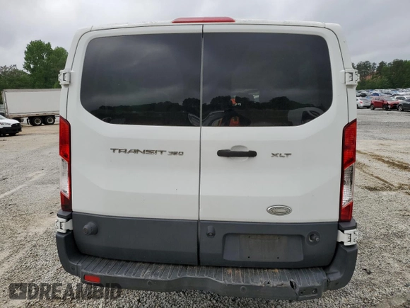 2015 Ford Transit XL z VIN 1FBZX2ZM5FKA73192, wystawiony jako Copart lot #54379885 z przebiegiem Nie podano mil oraz Szkody całkowita. Historia ofert i sprzedaży dostępna na DreamBid. Obrazek 6.