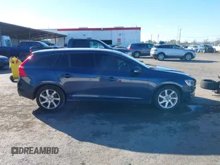 2015 Volvo V60 T5 Drive-E with VIN YV140MEJ8F1261268, listed as a IAAI auction lot 41517740 with 112,991 mi miles. Bid and sale history available at carsss.com. Image 13.