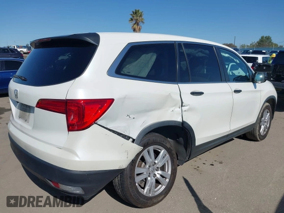 2016 Honda Pilot LX with VIN 5FNYF5H12GB051880, listed as a IAAI auction lot 41965816 with 112,705 mi miles and . Bid and sale history available at DreamBid. Image 4.