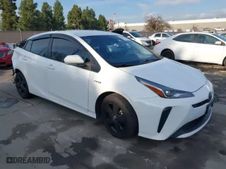 2021 Toyota Prius L Eco with VIN JTDKAMFU9M3131228, listed as a IAAI auction lot 41257117 with 72,840 mi miles. Bid and sale history available at carsss.com. Image 1.