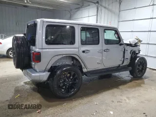 2021 Jeep Wrangler Unlimited Sahara Altitude with VIN 1C4HJXEN1MW692690, listed as a Copart auction lot 84927014 with 34,268 mi miles and Salvage title. Bid and sale history available at DreamBid. Image 3.