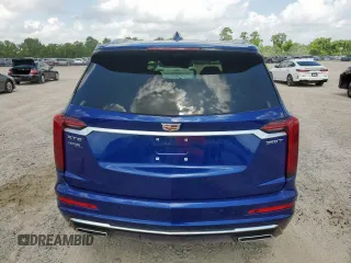 2023 Cadillac XT6 FWD Luxury с VIN 1GYKPAR42PZ167668, выставлен на аукционе Copart как лот 62093575 с пробегом 32 212 миль миль и Списание • Salvage title. История ставок и продаж доступна на DreamBid. Изображение 6.