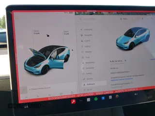2021 Tesla Model Y Standard Range z VIN 5YJYGDED4MF123311, wystawiony jako IAAI lot #41200519 z przebiegiem 70 190 mil mil oraz . Historia ofert i sprzedaży dostępna na DreamBid. Obrazek 18.