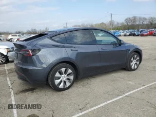 2023 Tesla Model Y Long Range with VIN 7SAYGDEE2PA024693, listed as a Copart auction lot 52595935 with 35,179 mi miles and Salvage Title. Bid and sale history available at DreamBid. Image 3.