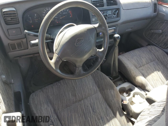 1999 Nissan Frontier XE with VIN 1N6ED26Y1XC302907, listed as a Copart auction lot 51323035 with 218,325 mi miles and Clean title. Bid and sale history available at DreamBid. Image 8.