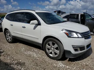 2015 Chevrolet Traverse LTZ with VIN 1GNKVJKDXFJ212107, listed as a Copart auction lot 55721935 with 129,333 mi miles and Clean Title. Bid and sale history available at DreamBid. Image 4.