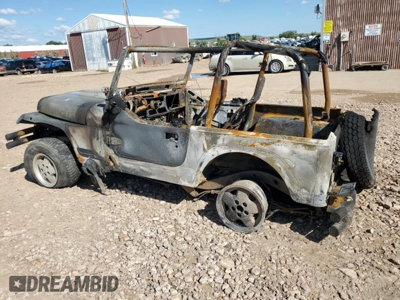 1992 Jeep Wrangler z VIN 2J4FY19P5NJ502467, wystawiony jako Copart lot #77054933 z przebiegiem Nie podano mil oraz Czysty tytuł • Clean title. Historia ofert i sprzedaży dostępna na DreamBid. Obrazek 2.