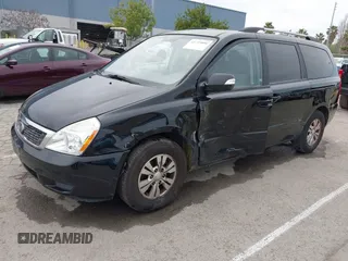 2012 Kia Sedona LX with VIN KNDMG4C78C6502141, listed as a IAAI auction lot 41725800 with 153,789 mi miles and . Bid and sale history available at carsss.com. Image 2.