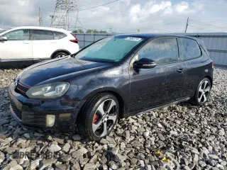2012 Volkswagen GTI w/Conv & Sunroof z VIN WVWEV7AJ1CW090672, wystawiony jako Copart lot #71884774 z przebiegiem 116 996 mil mil oraz Szkoda całkowita • Salvage title. Historia ofert i sprzedaży dostępna na DreamBid. Obrazek 1.