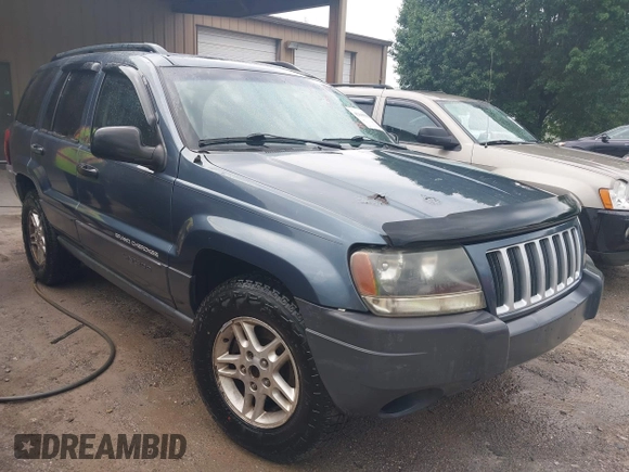 2004 Jeep Grand Cherokee Laredo z VIN 1J4GW48S64C152101, wystawiony jako IAAI lot #42165988 z przebiegiem 244 247 mil mil oraz . Historia ofert i sprzedaży dostępna na DreamBid. Obrazek 1.