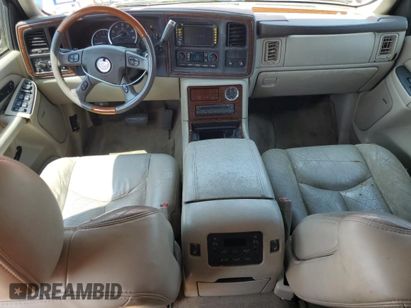 2004 Cadillac Escalade z VIN 1GYEK63N24R251463, wystawiony jako Copart lot #59404565 z przebiegiem 215 203 mil mil oraz Czysty tytuł • Clean title. Historia ofert i sprzedaży dostępna na DreamBid. Obrazek 8.
