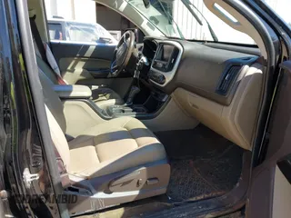 2015 GMC Canyon 2WD SLT with VIN 1GTG5CE35F1249224, listed as a IAAI auction lot 41697796 with 180,230 mi miles. Bid and sale history available at carsss.com. Image 5.