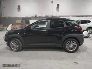 2019 Hyundai Kona SEL with VIN KM8K6CAA4KU382976, listed as a IAAI auction lot 41820749 with 61,619 mi miles. Bid and sale history available at carsss.com. Image 14.