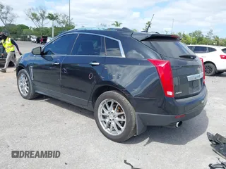 2013 Cadillac SRX Performance Collection z VIN 3GYFNDE39DS543037, wystawiony jako IAAI lot #42162276 z przebiegiem 156 282 mil mil oraz . Historia ofert i sprzedaży dostępna na DreamBid. Obrazek 3.