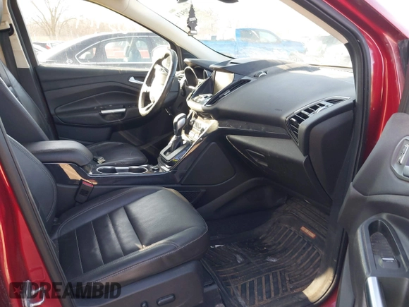 2015 Ford Escape Titanium z VIN 1FMCU9J9XFUC75357, wystawiony jako IAAI lot #41705474 z przebiegiem 198 381 mil mil oraz . Historia ofert i sprzedaży dostępna na DreamBid. Obrazek 5.