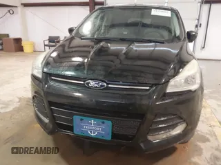 2014 Ford Escape SE z VIN 1FMCU9GX6EUB69007, wystawiony jako IAAI lot #41710065 z przebiegiem 113 080 mil mil oraz . Historia ofert i sprzedaży dostępna na DreamBid. Obrazek 11.