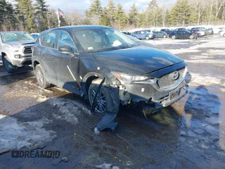 2018 Mazda CX-5 Sport with VIN JM3KFBBM8J0372701, listed as a IAAI auction lot 41643531 with 85,886 mi miles. Bid and sale history available at carsss.com. Image 1.