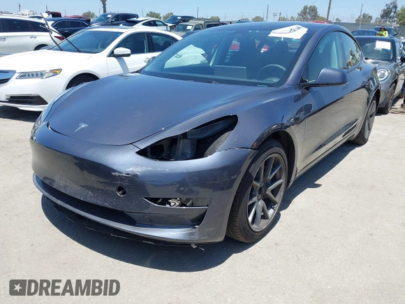 2023 Tesla Model 3 with VIN 5YJ3E1EA1PF545402, listed as a IAAI auction lot 42671354 with 37,948 mi miles and . Bid and sale history available at DreamBid. Image 2.
